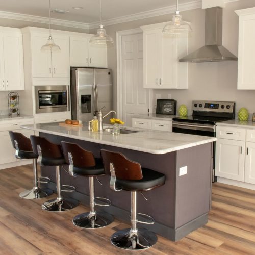 kitchen with island countertop and dining stools