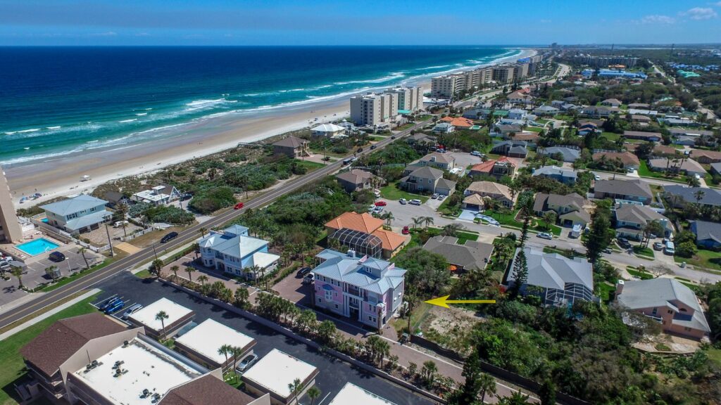 The city of Ponce Inlet shown from above with proximity to beach and Atlantic Ocean