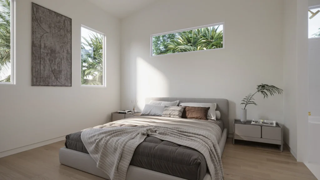 Sunlit guest bedroom in the Charlotte model with vaulted ceiling and palm-view windows at Six in the City, College Park, Orlando