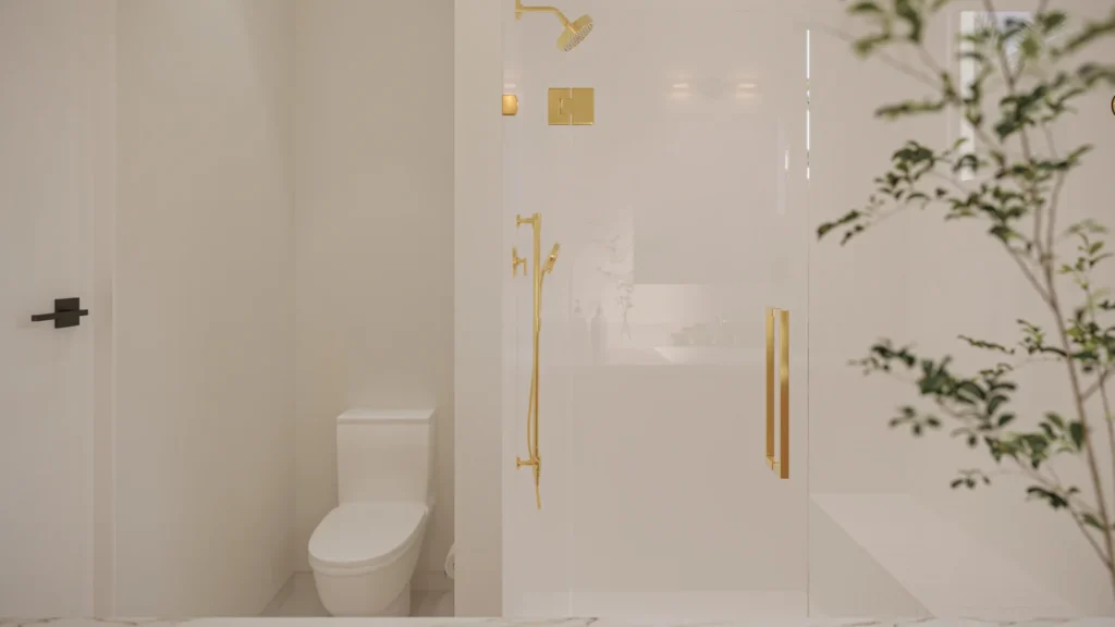 Charlotte model primary bathroom with a glass walk-in shower and gold fixtures at Six in the City in College Park, Orlando