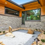 interior zen courtyard connecting living spaces in japandi home