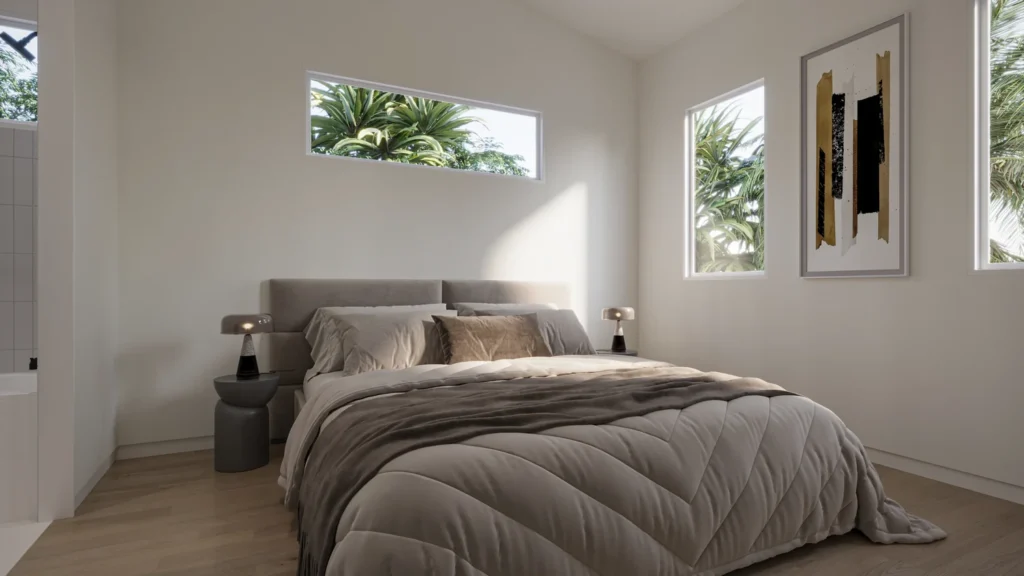 Sunlit guest bedroom in the Miranda model with vaulted ceiling and lush palm-view windows at Six in the City, College Park, Orlando